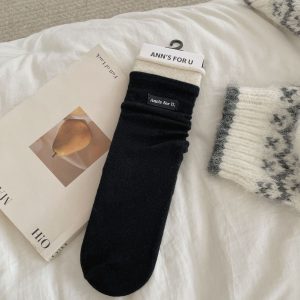 Women's rolled-cuff mid-calf socks, black — fabric label, seamless toe